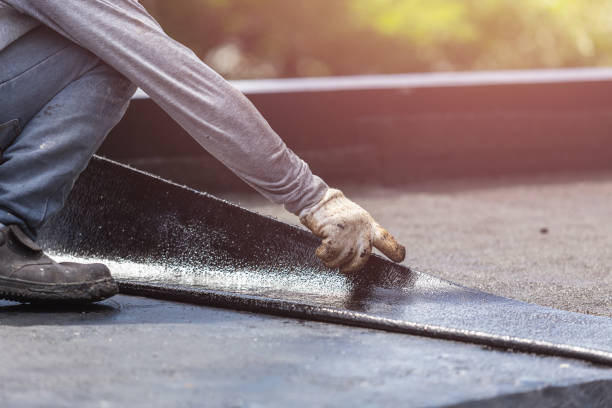 Professional Basement Waterproofing technician working in Westwood, PA